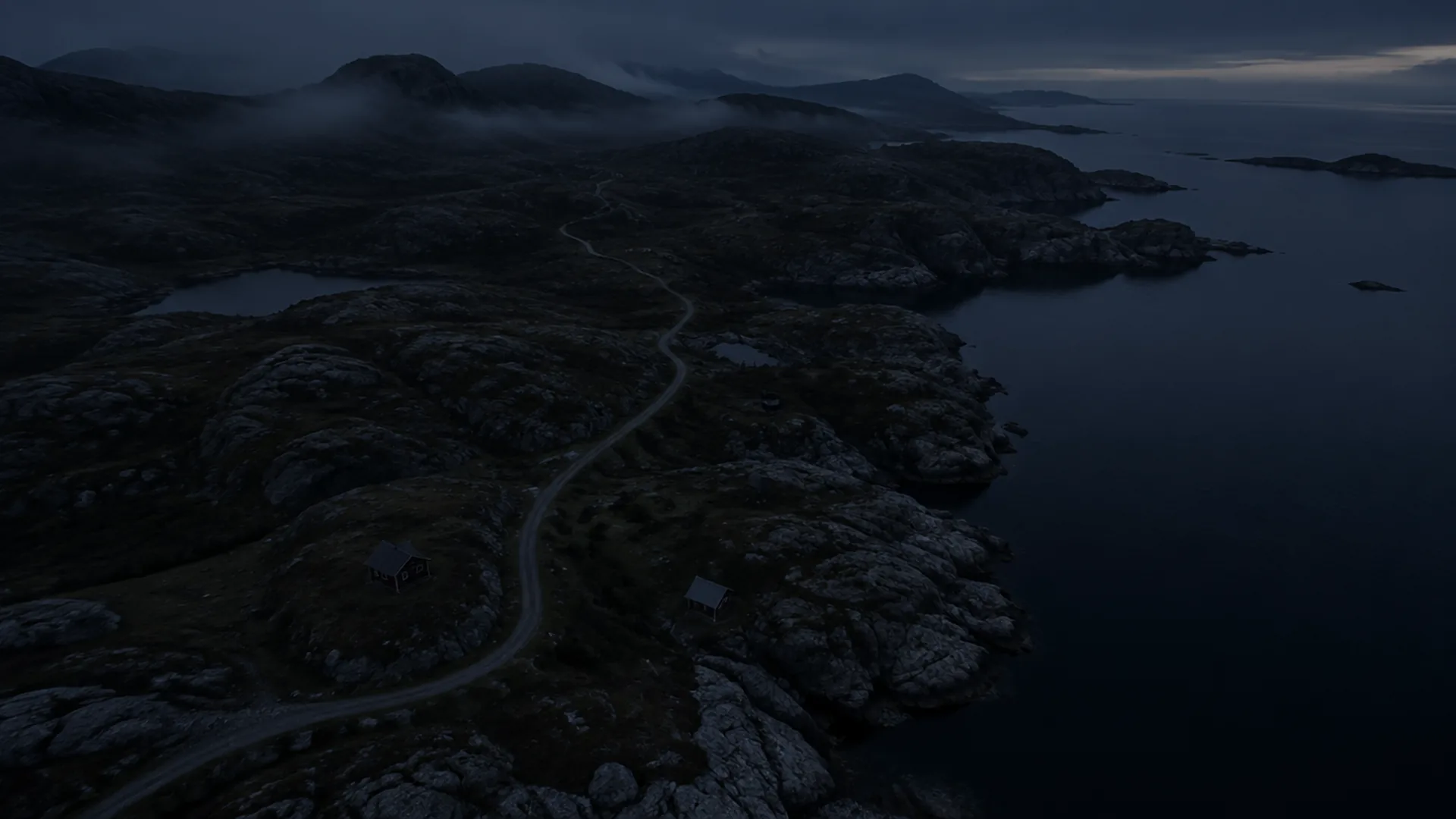 A coastal road at dusk, seen from above